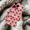 Coque iPhone Motif Cerises Rouges sur Fond Rose